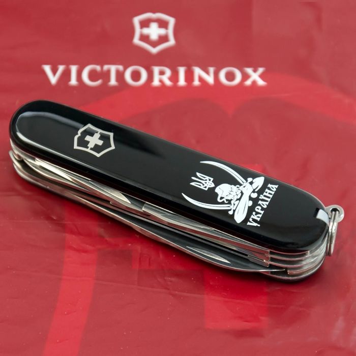 Складной нож Victorinox HUNTSMAN UKRAINE Козак с саблями бел. 1.3713.3_T1110u купить недорого в Ты Купи
