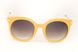 Сонцезахисні круглі жовті жіночі окуляри