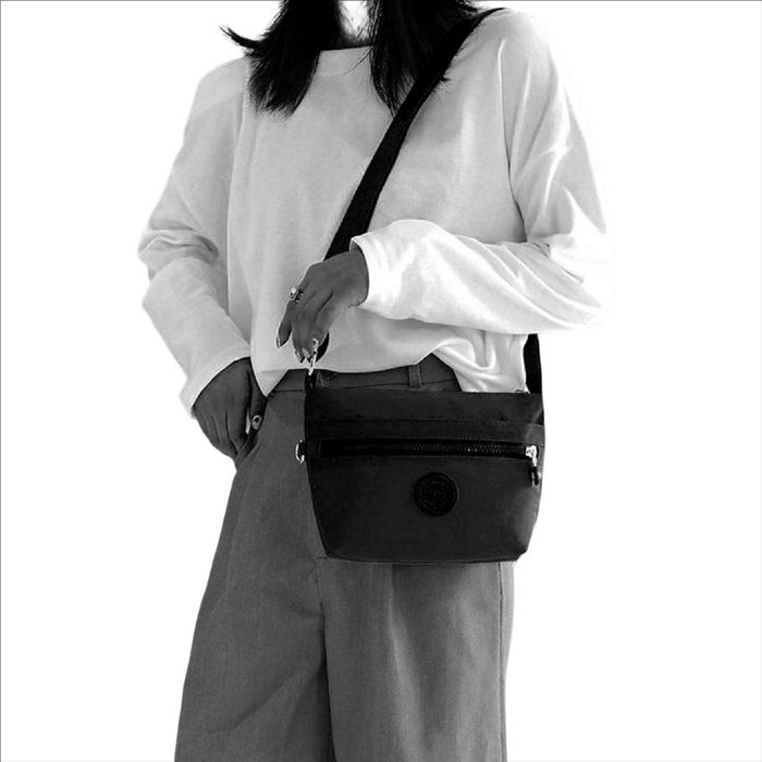 Маленька чорна текстильна сумка через плече Confident WT-5058A купити недорого в Ти Купи