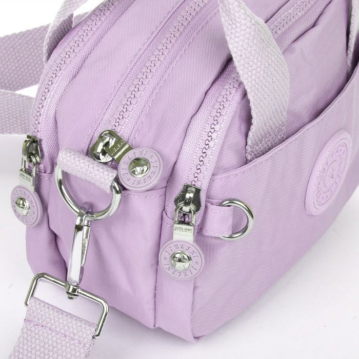 Жіноча сумка Jielshi B122 l.purple купити недорого в Ти Купи