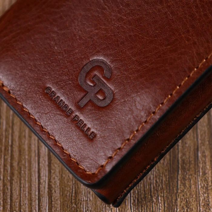 Кожаный женский кошелек ручной работы GRANDE PELLE 16786 купить недорого в Ты Купи